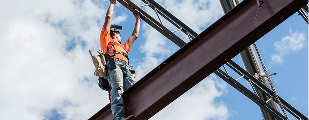 Steel worker on a beam