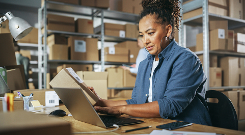 Woman looking at a bill